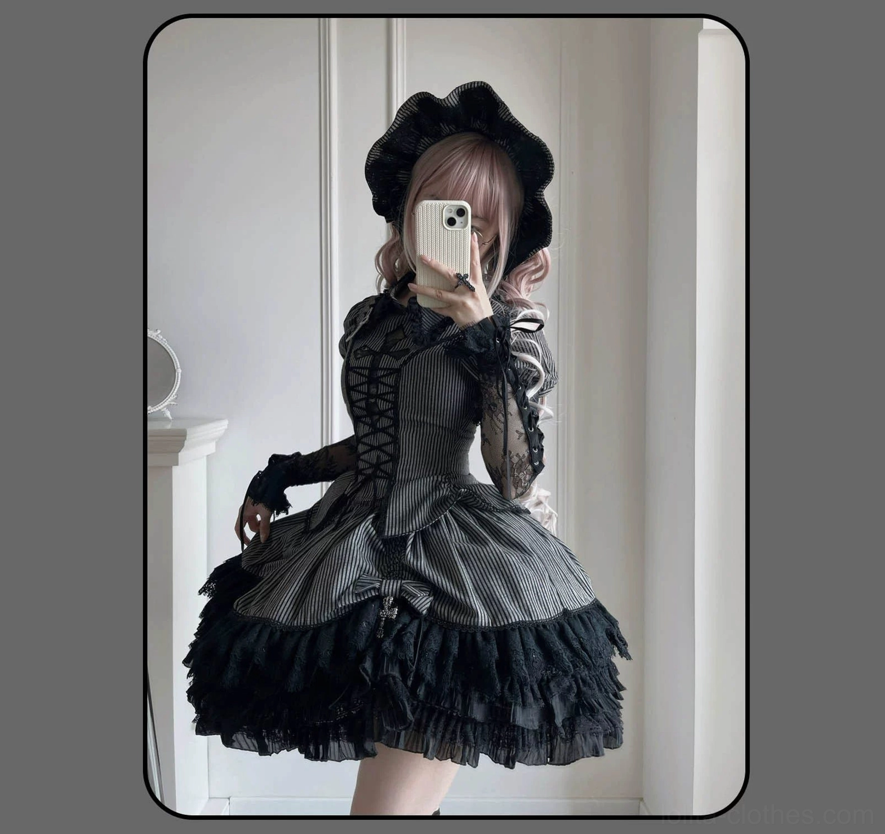 Gothic Lolita lace-up corset blouse with oxidized cross pendant details and yarn-dyed striped fabric texture