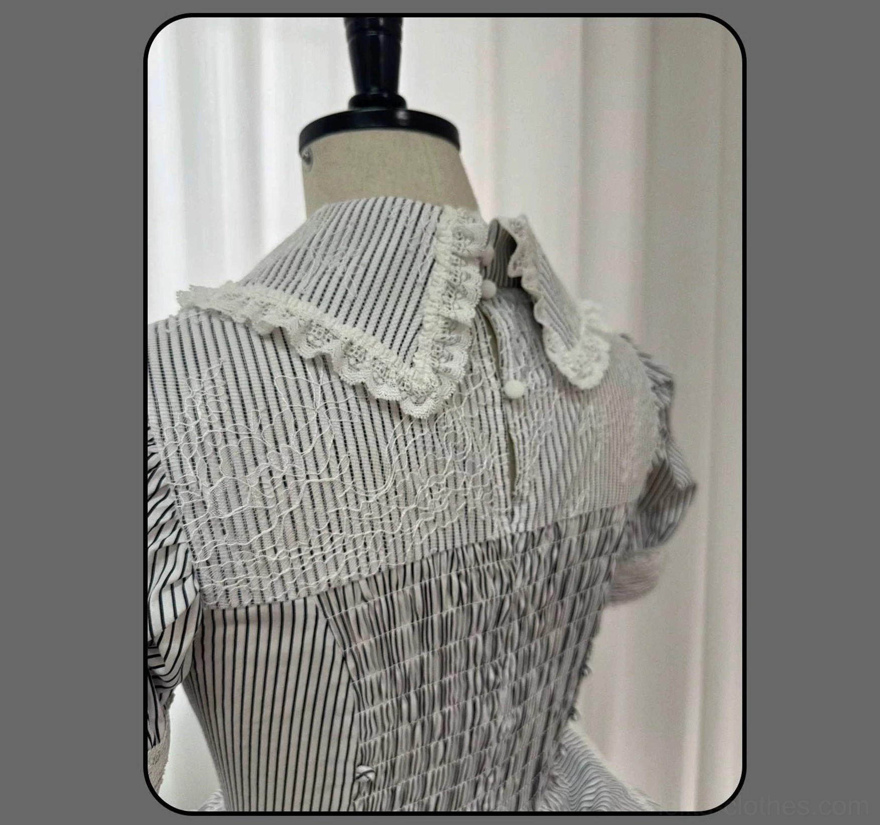 Striped Gothic Lolita blouse with lace-up corset bodice showing dual drawstring control and shirring detail