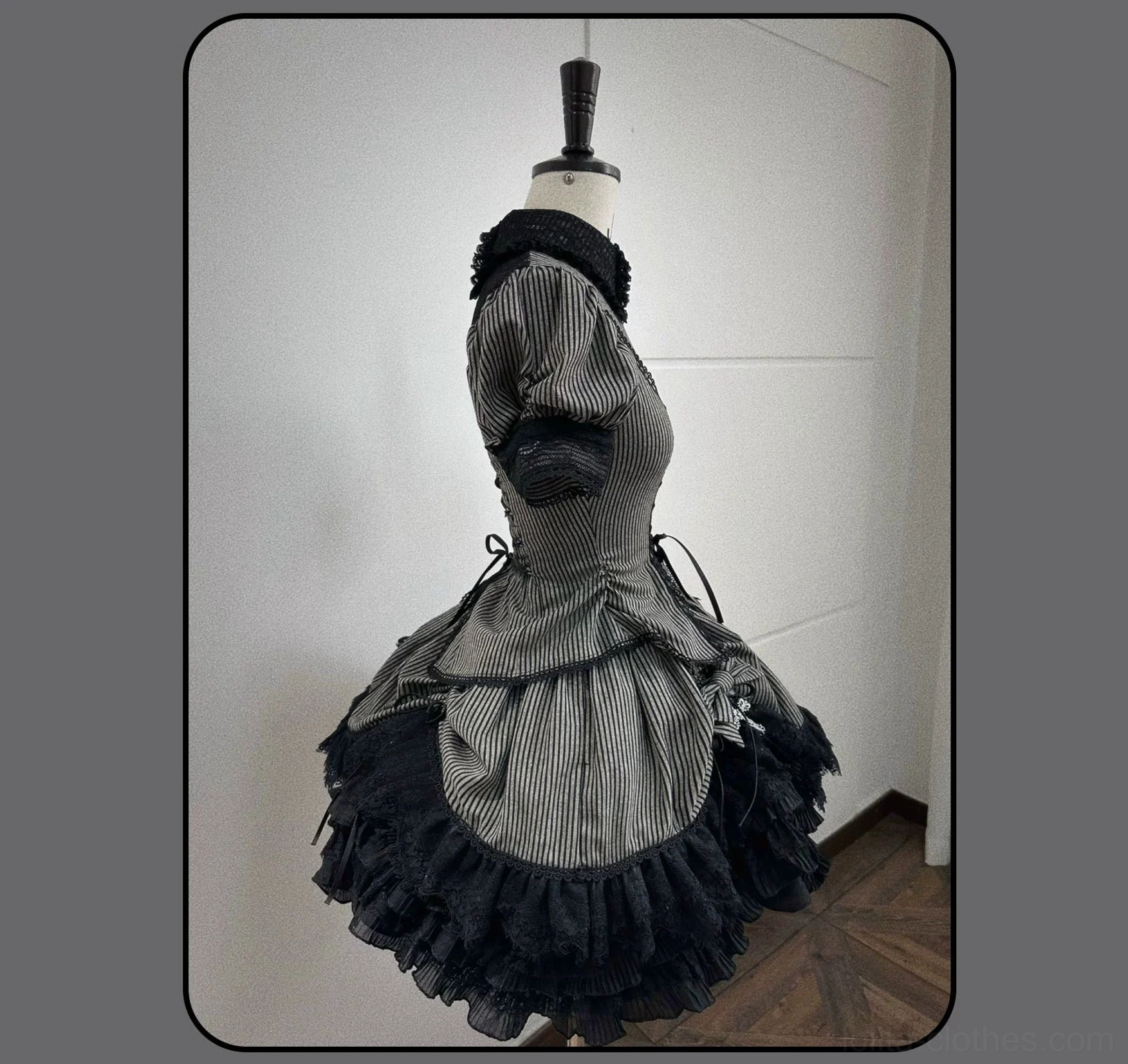 Gothic Lolita striped blouse and skirt featuring lace-embroidered cross pendant and sacred symbolism