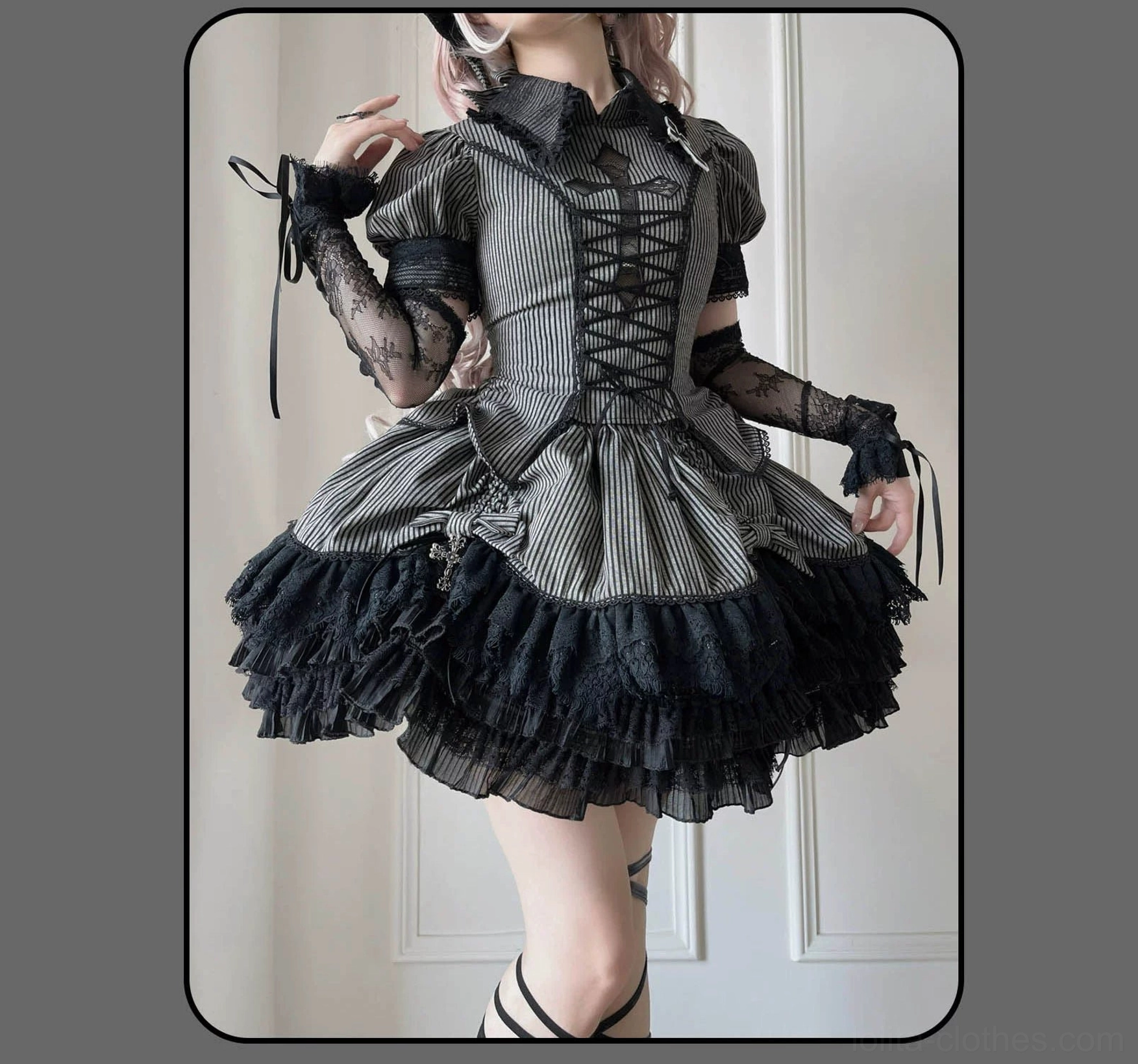 Dark striped Gothic Lolita blouse and skirt showing front and side silhouette structure