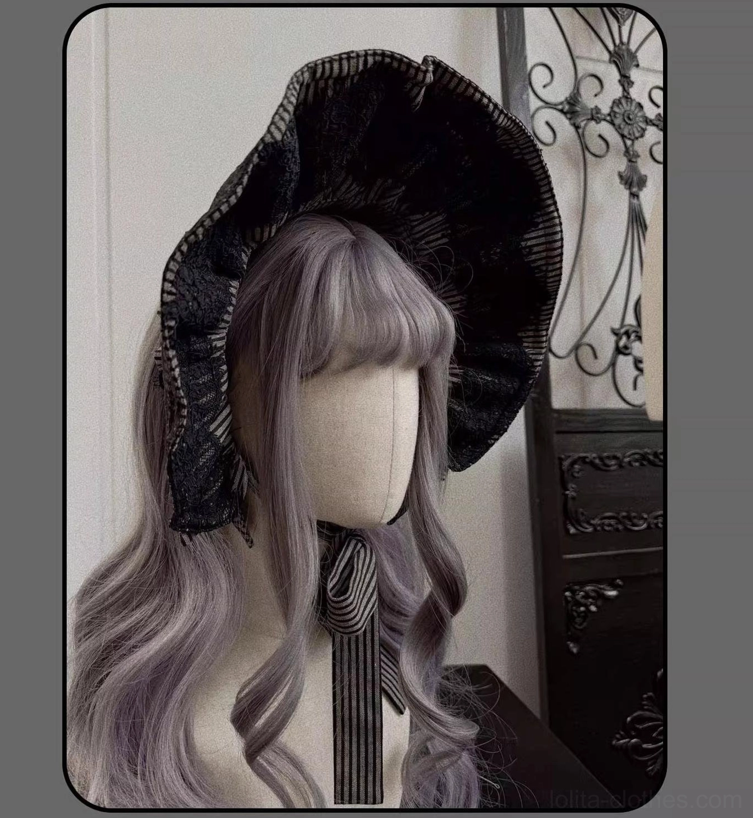 Gothic Lolita striped coordinate showing blouse-to-skirt proportions and ruffled hem volume