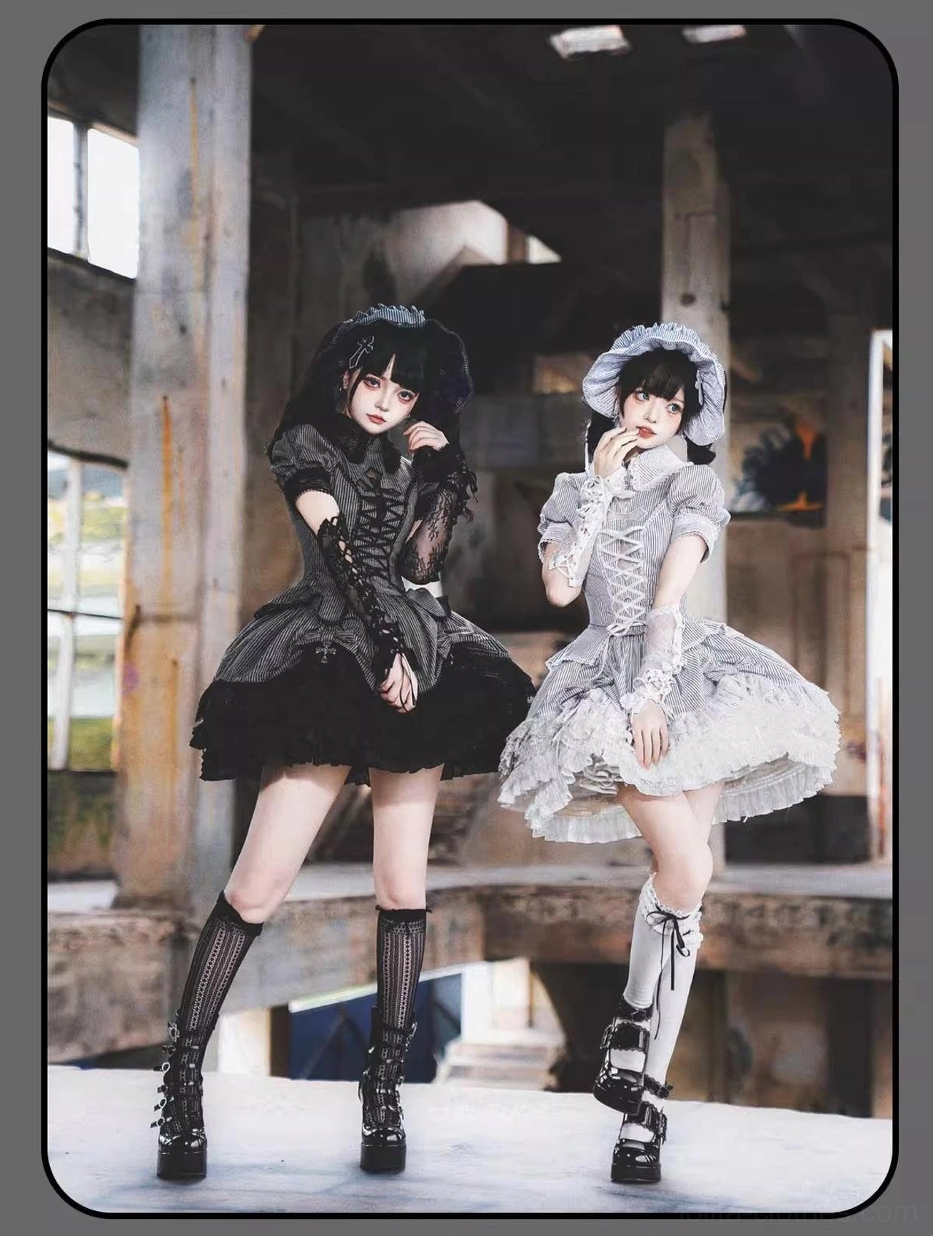 Striped Gothic Lolita coordinated set with lace-up bodice and tiered skirt, full-body side shot in industrial indoor space showing silhouette profile