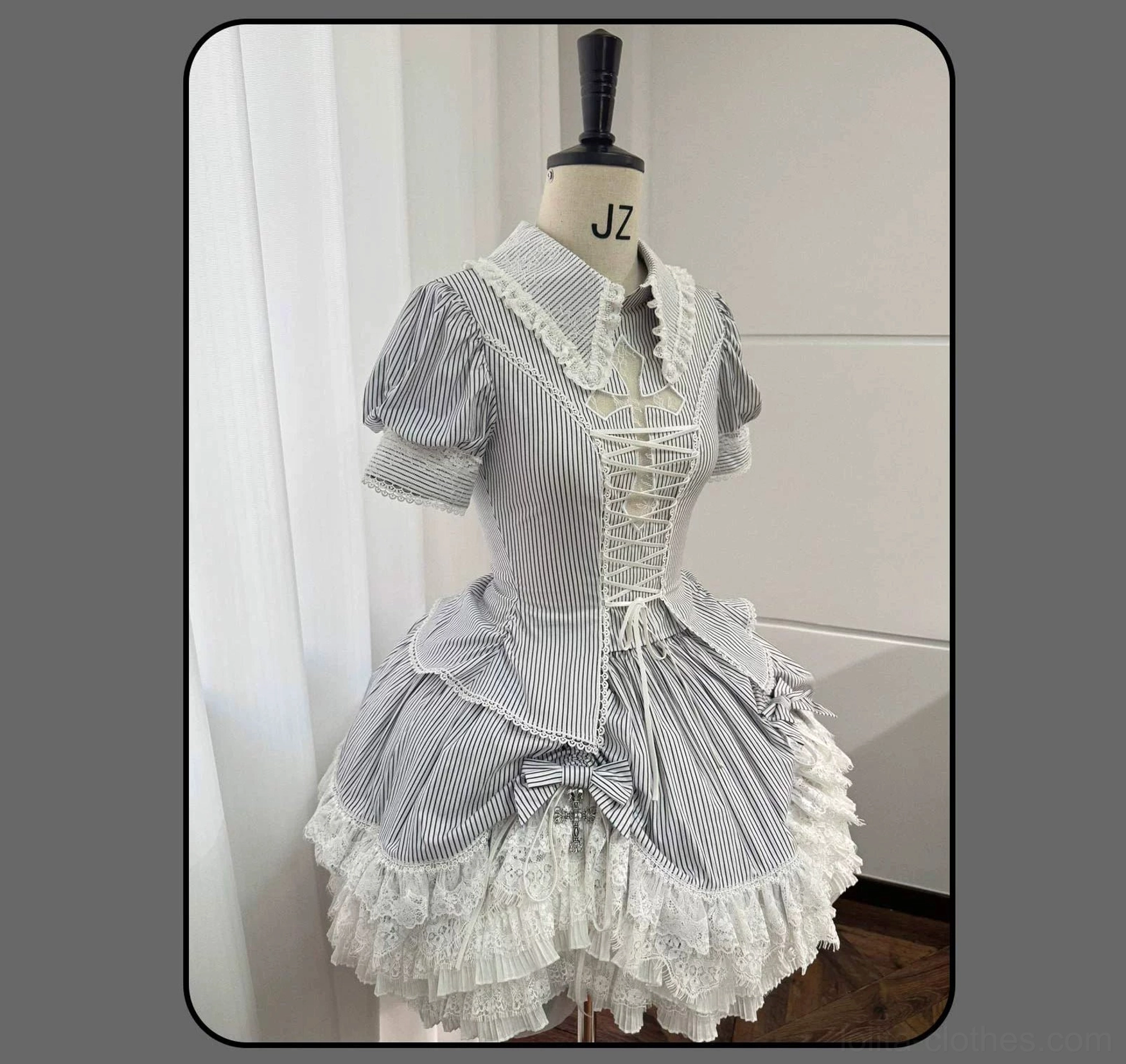 Striped Gothic Lolita coordinated blouse and skirt showing vertical stripe pattern consistency