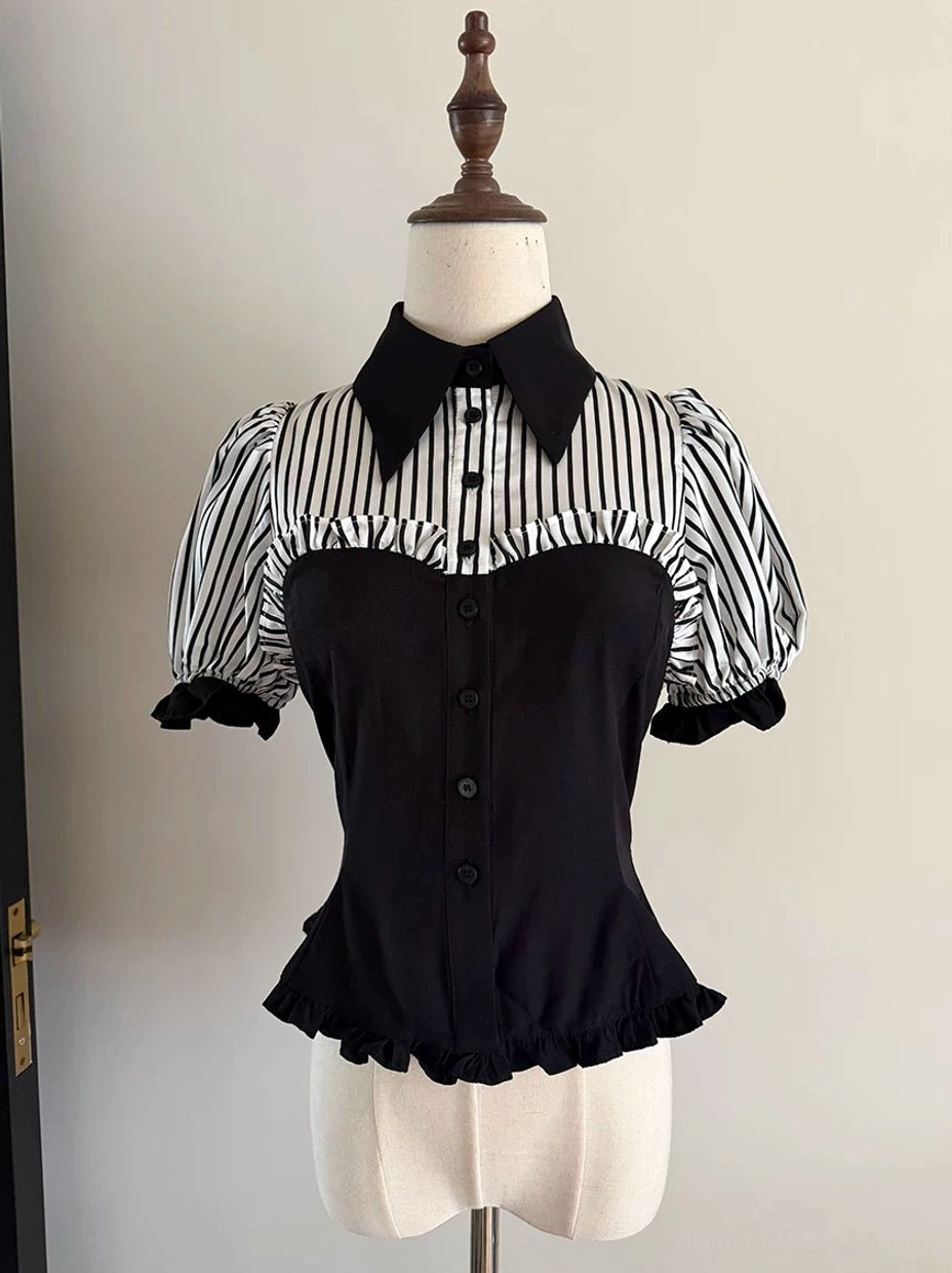 Gothic lolita striped patchwork blouse front view with puff sleeves and pointed collar on mannequin displaying black-white vertical striped pattern