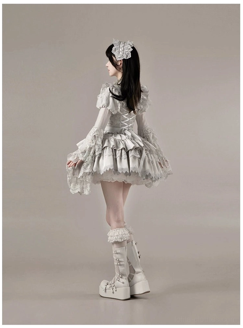 Gothic lolita subculture symbolism showing cross ecclesiastical swan candlestick spiritual meaning representation