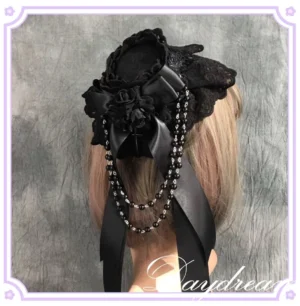 Gothic Lolita tea party top hat hair accessory back three-quarter view on wig display showing complete lace detailing, decorative bow, fabric rose embellishment, and long ribbon tails