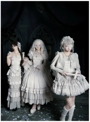 Gothic lolita trio outfit collection featuring three off-white dress styles with one model holding cross prop group three quarter view