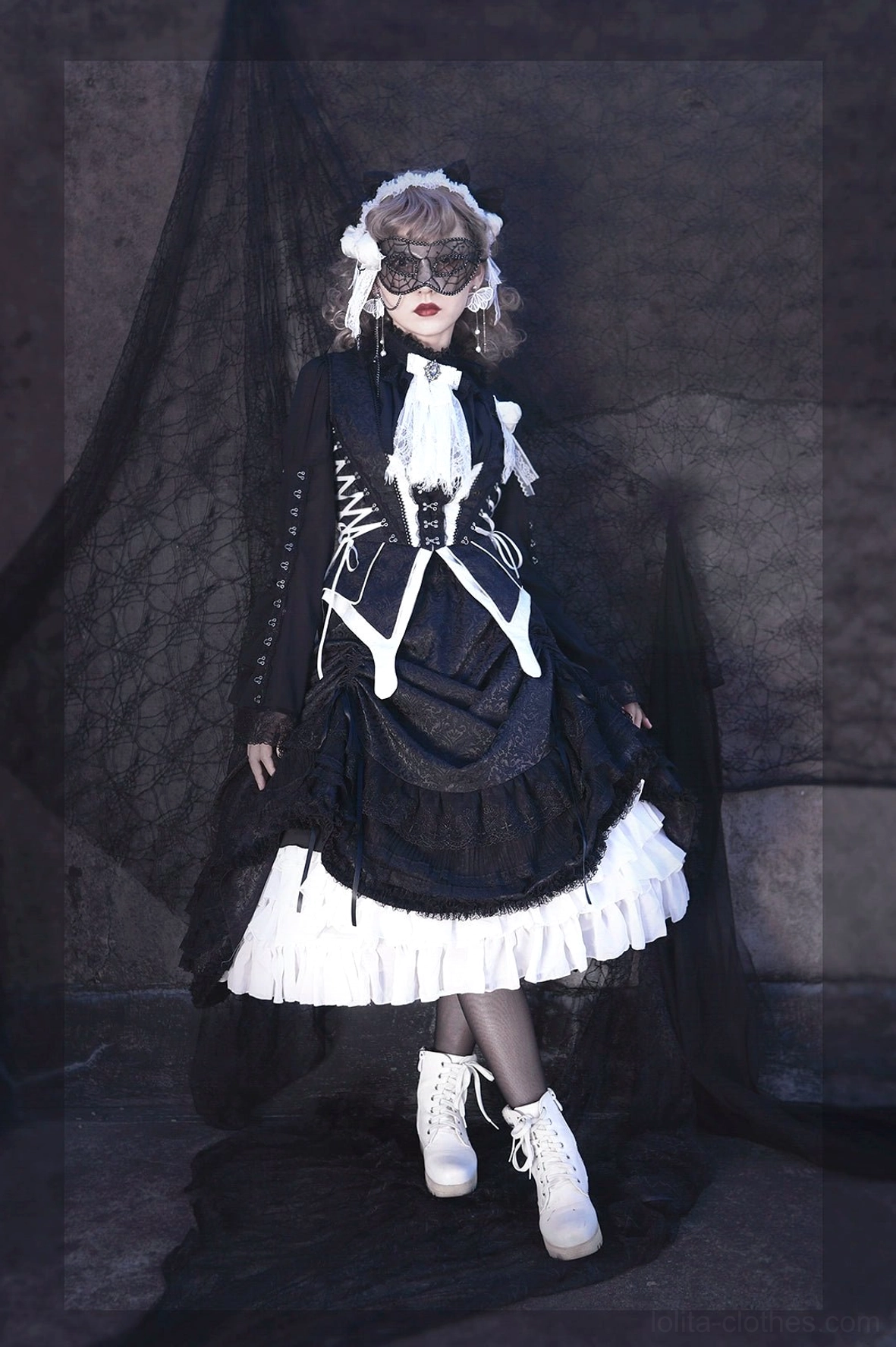 Floor-length gothic lolita tiered ruffled dress set displaying high-neck construction, multi-layered lace hem, formal gothic aesthetic, and intricate lace fabric composition