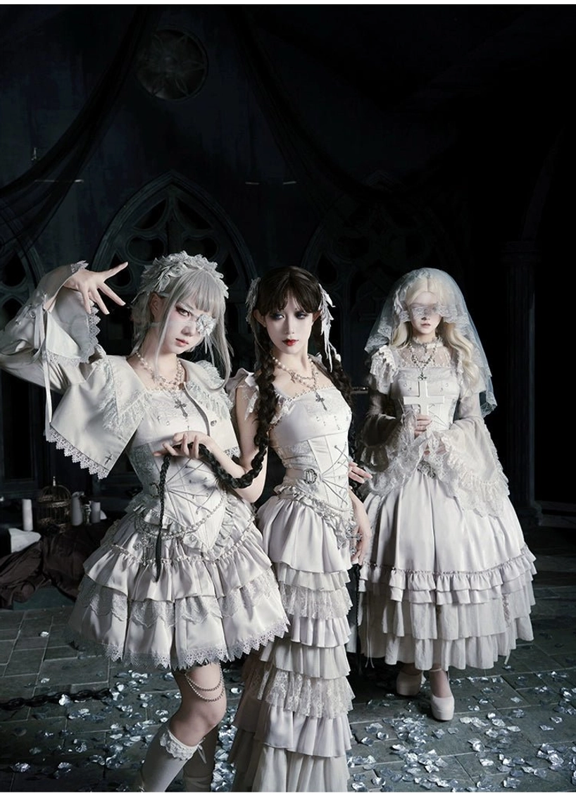 Dynamic gothic lolita trio outfits with varied skirt lengths lace frill details and model poses on dark gothic indoor background