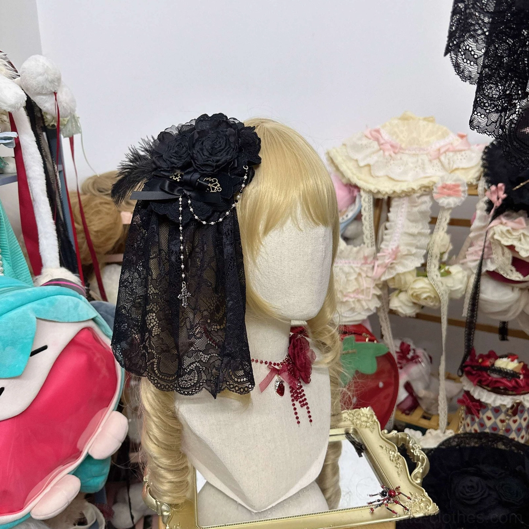 Gothic Lolita veil hair accessory with black lace rose and feather decorations and dangling bead chains