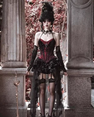 Full front standing view of gothic velvet lolita ensemble with structured boned corset thigh-high stockings and flowing ruffled tulle skirt with removable train