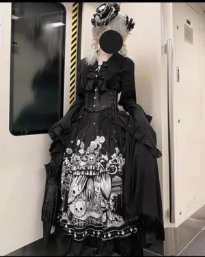 Full-body Gothic Lolita outfit featuring black waist corset worn with ruffled blouse and printed skirt monochrome vintage subway setting
