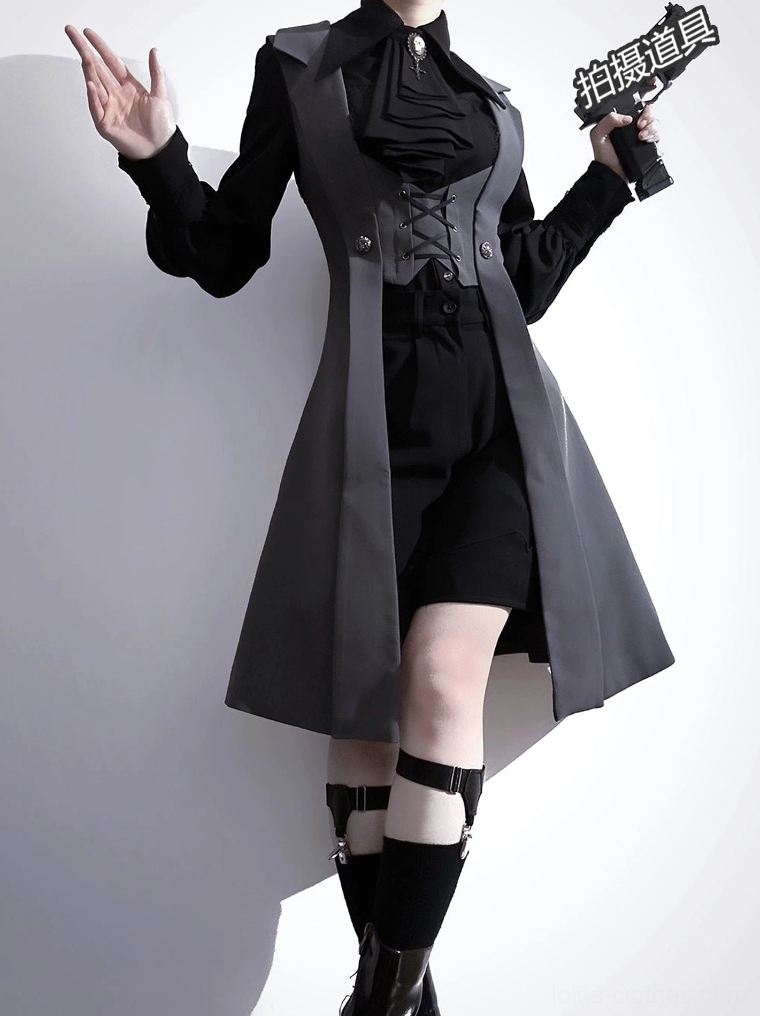 Gothic Lolita waistcoat bicolor black-gray corset front trim front three-quarter pose leg buckle sock accessories raised hand gesture
