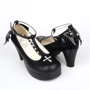 Gothic Lolita winged cross embroidered high heel shoes with detachable angel wings, three-quarter side view, black leather upper with white toe cross and lace-trimmed details