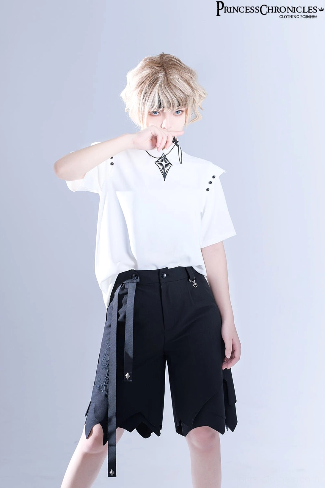 Gothic necklace wearing effect left oblique half-body portrait model showing shoulder stud details