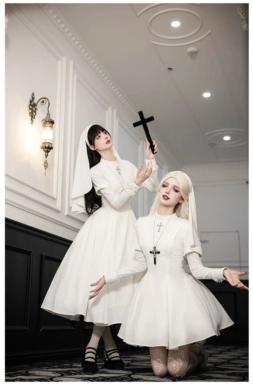 Gothic nun lolita dress detail shot embroidery cross bodice craftsmanship
