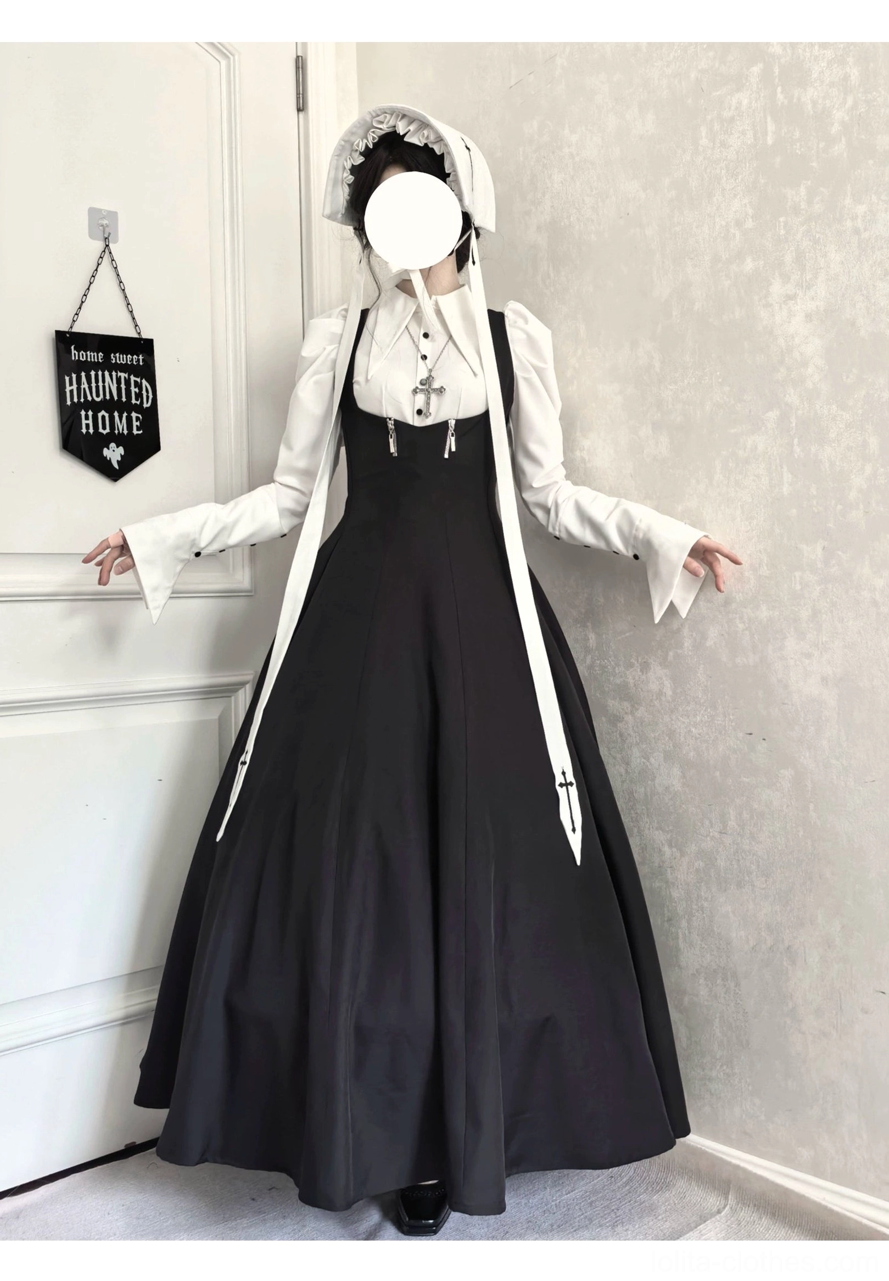 Complete gothic nun lolita full outfit with black flared JSK, white puff-sleeve blouse, nun bonnet and cross embroidery at haunted home doorway