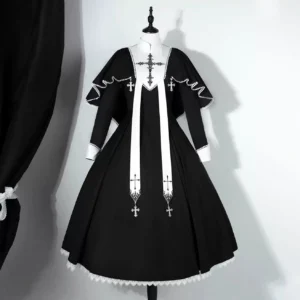 Gothic nun-inspired Lolita OP dress with cross embroidery and detachable pearl-button cape, front full view on dress form, black and white color scheme