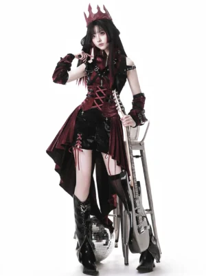 Full Gothic Ouji lolita outfit set featuring wine red and black color blocking, high-low suspender skirt, sleeveless corset top with stand collar, matching shorts and arm sleeves worn by model with crown headdress and combat boots