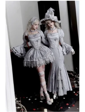 Gothic witch lolita sk suit silver-gray jacquard two-piece ensemble with short ruffled skirt and mermaid skirt displayed on models wearing witch hats and vintage-inspired boots