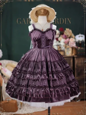 Grape purple velvet Lolita JSK dress with intricate lace-up corset bodice and tiered circular lace trim ruffles, showcasing delicate white underskirt edge and romantic Victorian silhouette