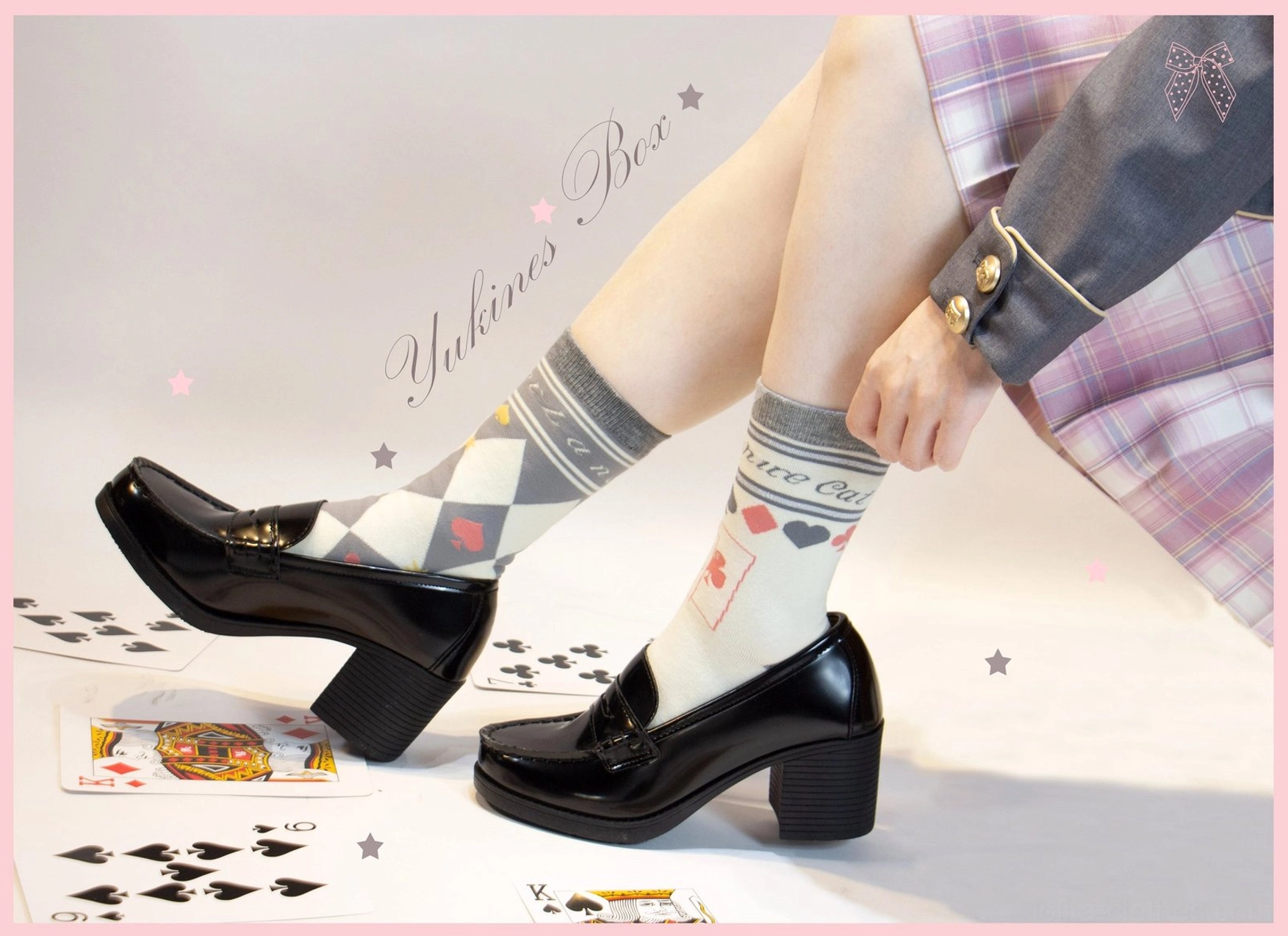 Gray and pink asymmetrical checkerboard lolita cotton mid-calf socks coordinated with maid outfit and hair bow styling ideas