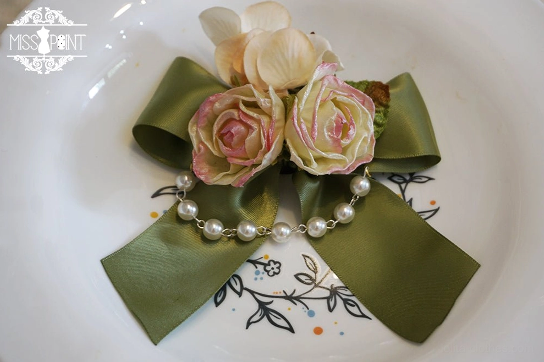 Green dual-use lolita flower bow accessory convertible hair clip and brooch attachment multiple styling versatile arrangement