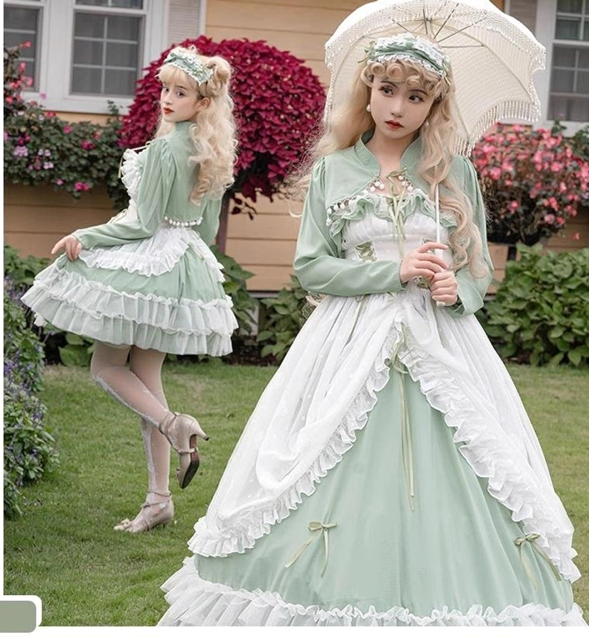 Texture close-up of sage green lolita wedding dress JSK showing blended yarn and premium lace fabric composition, satin finish, and quality material construction