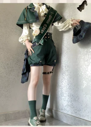 Green colorway Ouji Lolita set full body side view model wearing cape shirt shorts plaid sash