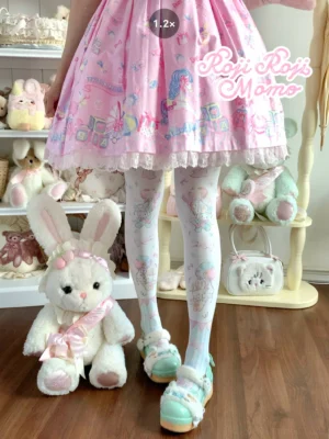 Green pastel bunny printed lolita tights back lower body view with mint platform shoes and pink skirt featuring adorable animal themed prints