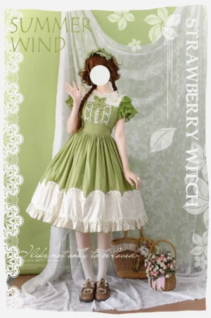Green Sweet Lolita OP dress with rose embroidery front view full body standing pose featuring tiered ruffled sleeves white lace collar and polka-dot hem