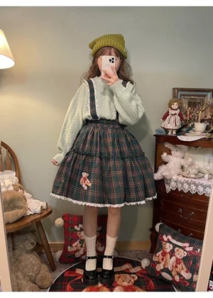 Green tartan lolita suspender skirt with white lace trim back mirror full-body shot vintage bedroom aesthetic
