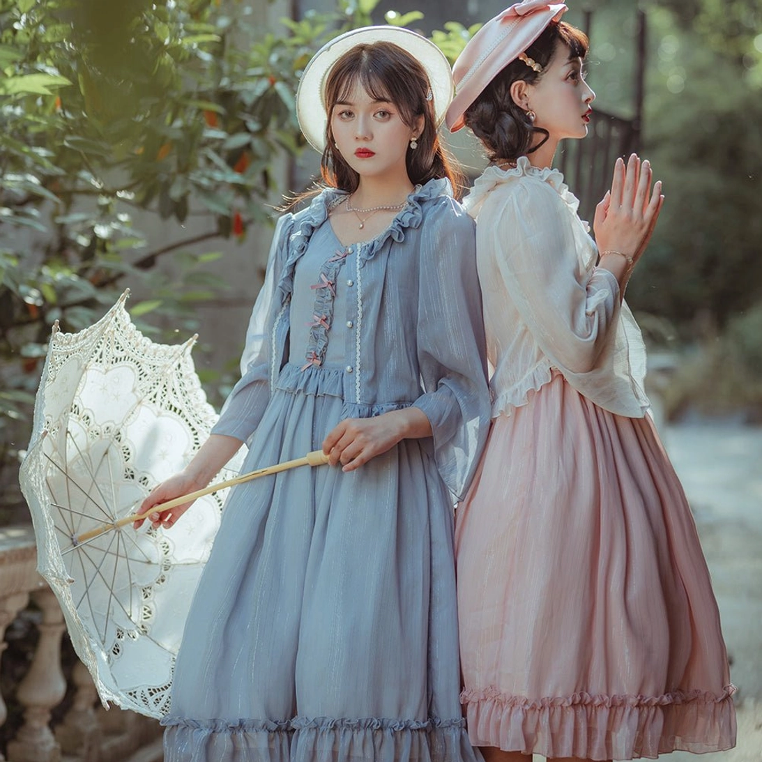 Grey blue lolita cardigan coordinate detail showing ruffled construction, ribbon lace-up front, sophisticated color palette, and elegant aesthetic for classic lolita fashion expression