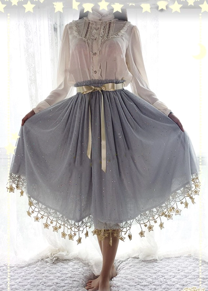 Grey lolita petticoat with gold star lace hem trim displaying full tulle volume and celestial design aesthetic
