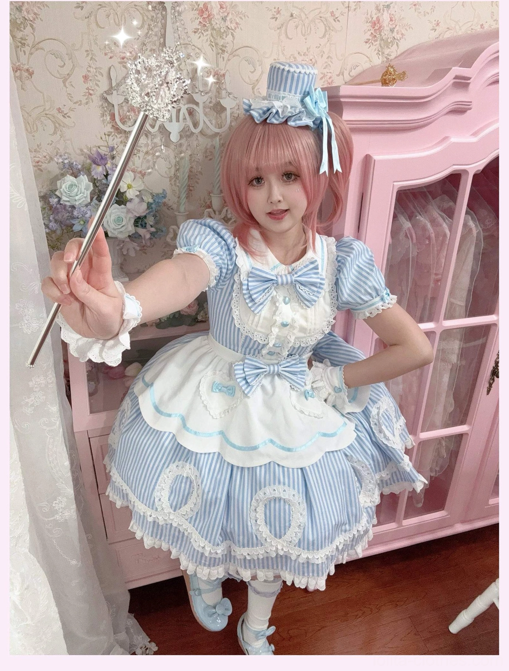 Group styling shot featuring multiple coordinated lolita looks using the striped OP dress in different colors