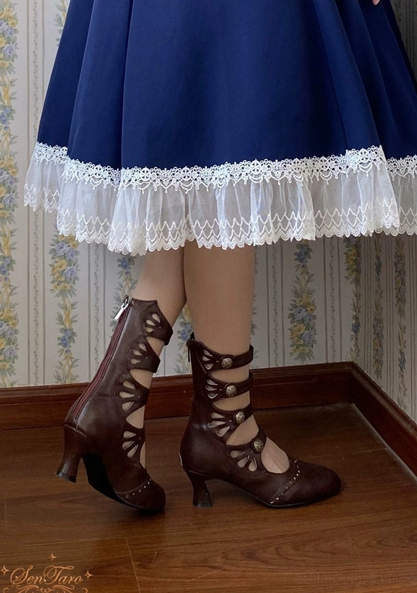 Handcrafted vintage Lolita Mary Jane boots with hollow-out botanical carved straps and decorative metal buckles
