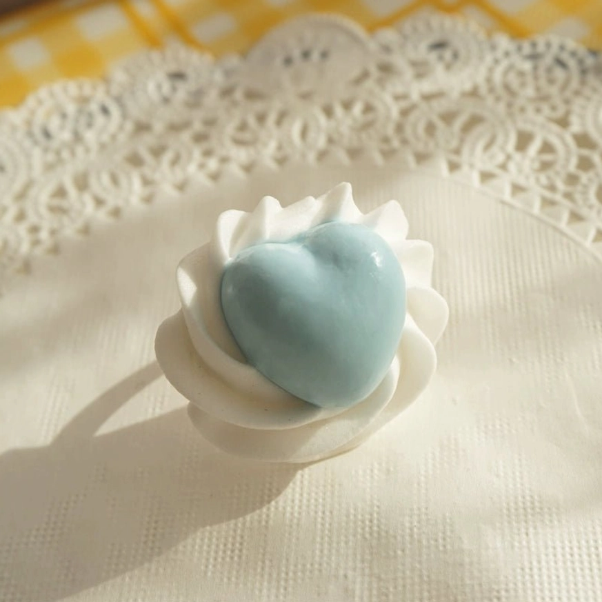 Blue handmade cream heart adjustable Lolita statement ring with pastel blue heart and dessert inspired cream setting