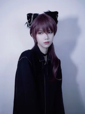 Handmade gothic Lolita cat ear hair accessory with silver chain decorations on androgynous model with light purple hair