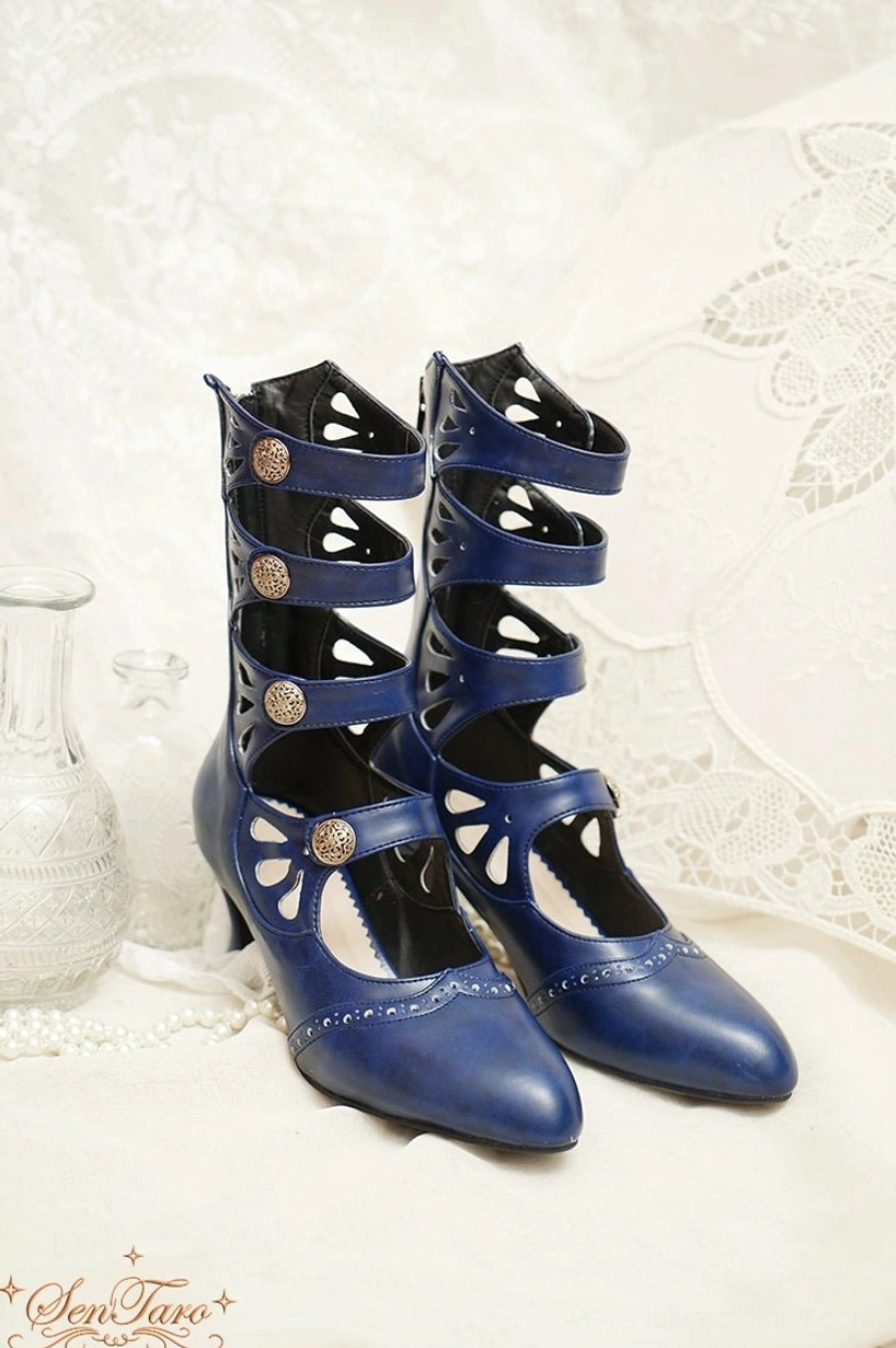 Handmade Lolita Mary Jane ankle boots with burgundy faux leather and carved botanical pattern hollow-out straps close-up detail