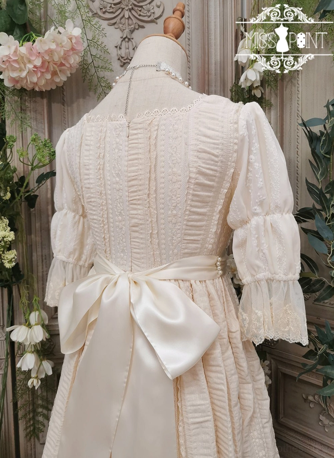Handmade lolita ribbon belt with pearl beading showcasing traditional waistband construction and classic floral embroidery weaving
