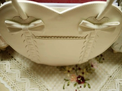 Heart-shaped Lolita tote bag color comparison multiple variations display shot fashion styling