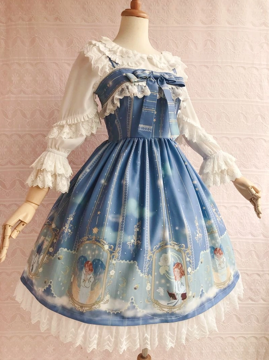 Heavenly angel-printed Lolita jumper skirt featuring mirror-framed angel portraits and star motifs - front angled view