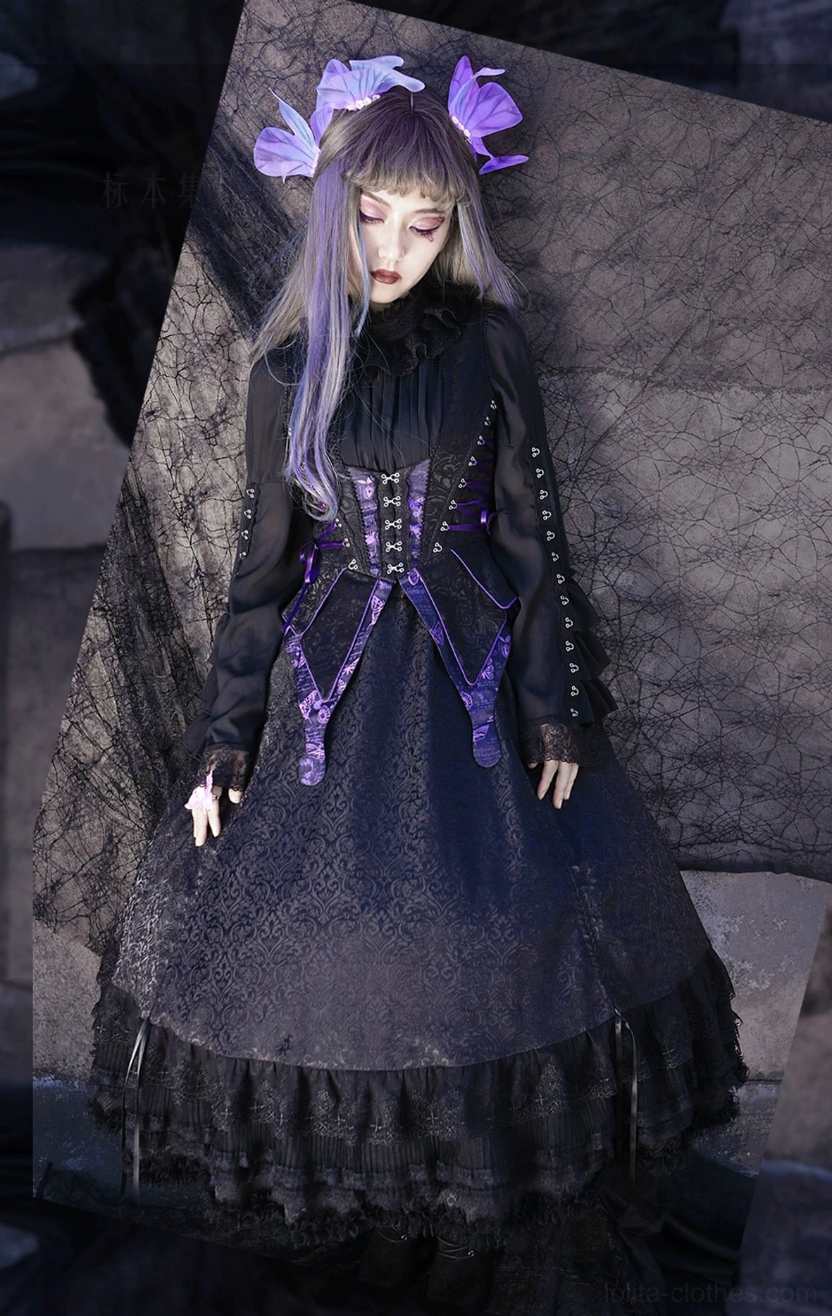 Full-length gothic lolita ensemble front view displaying complete four-piece set with high-neck blouse, structured corset vest, multi-tiered ruffled skirt hem, and butterfly lace accents