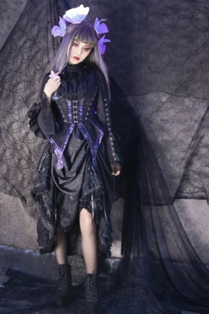 Herbarium gothic lolita corset vest blouse and tiered skirt ensemble displayed on model featuring black corset vest with purple decorative straps, bishop sleeve blouse with lace details, and full-length ruffled skirt