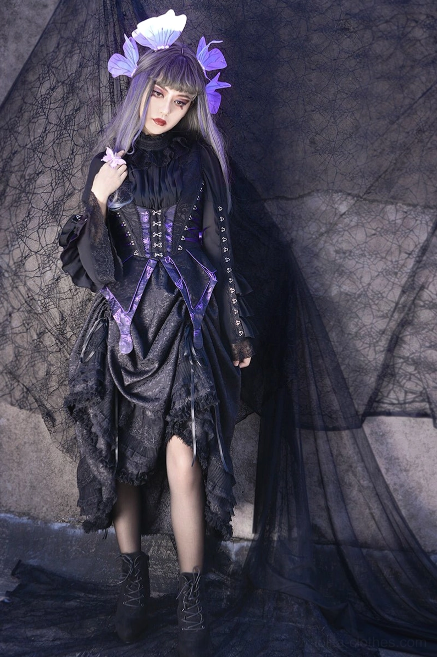 Herbarium gothic lolita corset vest blouse and tiered skirt ensemble displayed on model featuring black corset vest with purple decorative straps, bishop sleeve blouse with lace details, and full-length ruffled skirt