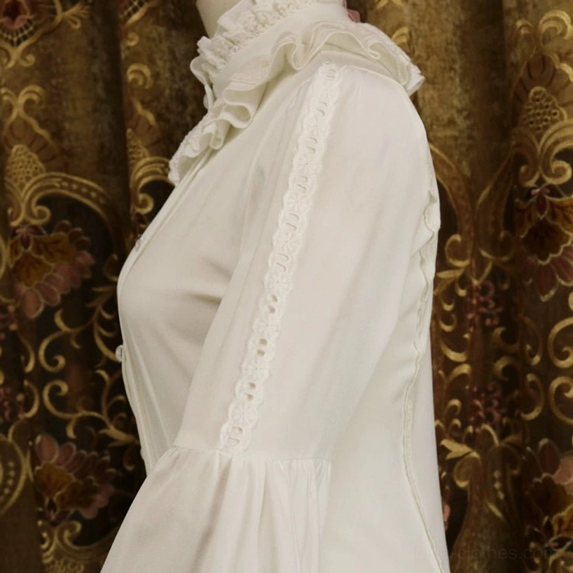 Detailed side view of adjustable Hime sleeve with lace trim seam detail, flared ruffled cuff, small button embellishments, and bell-shaped puff sleeve construction on classic Lolita blouse