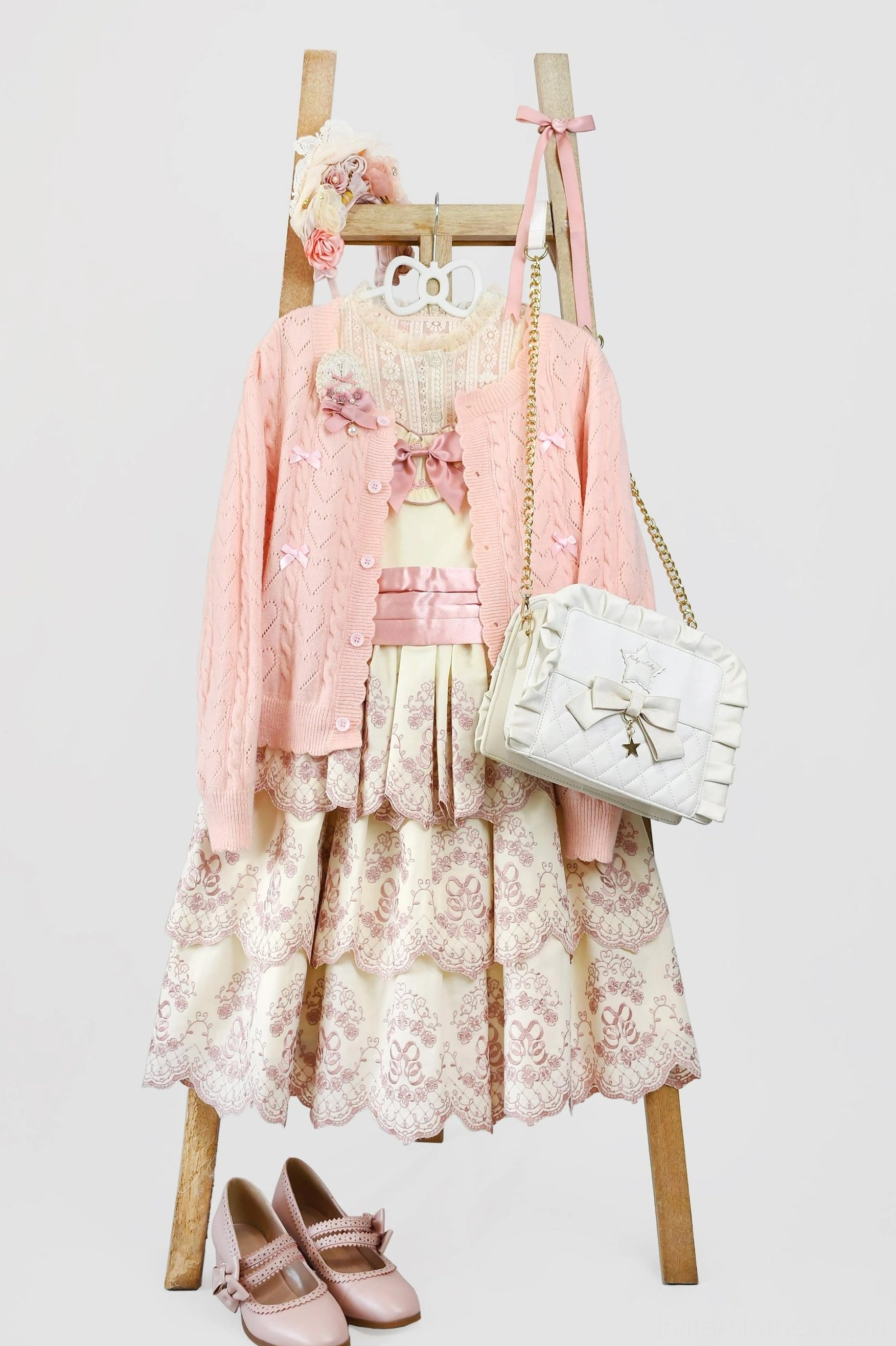 Hollow out long sleeve Lolita cardigan worn at Lolita tea party event, community meetup wearing example