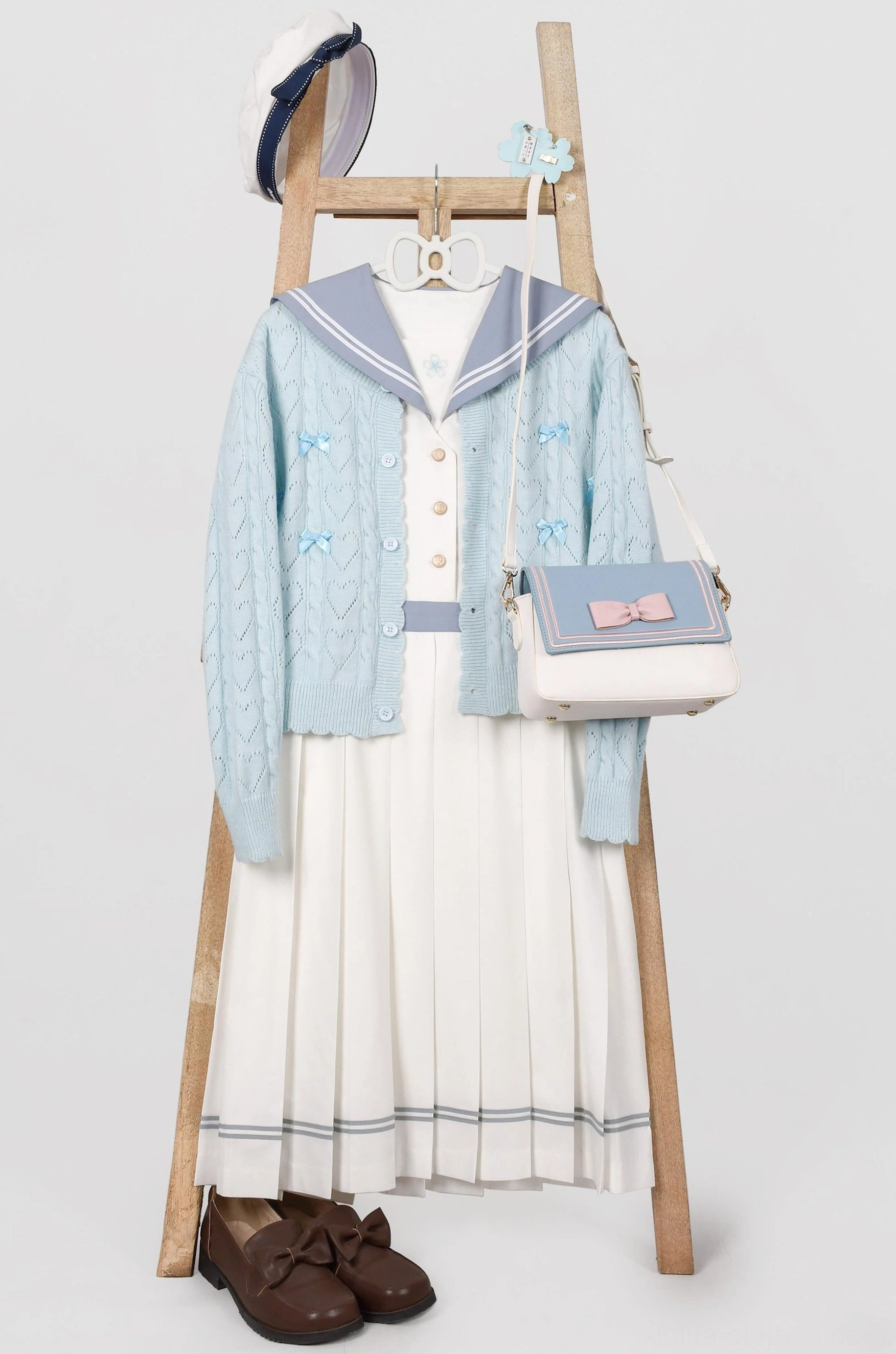 Hollow out Lolita cardigan styling inspiration with coordinating Lolita dress pieces and accessories