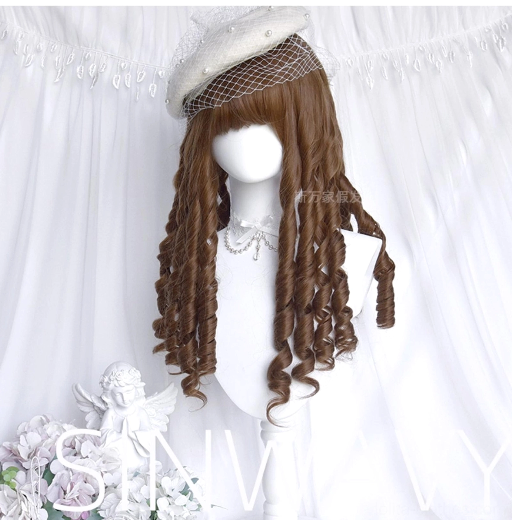 Honey brown straight bangs roman curl lolita wig styled with white beret, mesh veil, and pearl neck accessory on white curtain backdrop