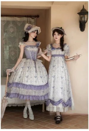 Twin lolita summer dress models wearing matching blue iris print empire OP and JSK in eye-level full-body indoor hallway shot with vintage bonnets